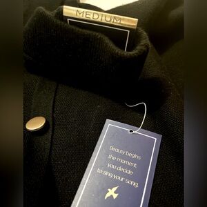 Beautiful black mid-length skirt with gold buttons size medium